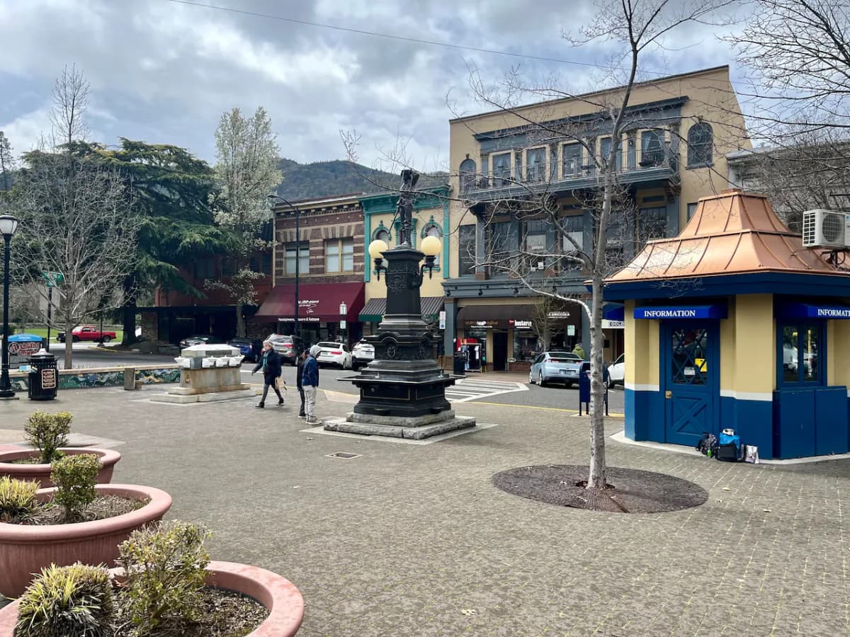 The Plaza in downtown Ashland, Oregon, with its historic monument, visitor information kiosk, and storefronts